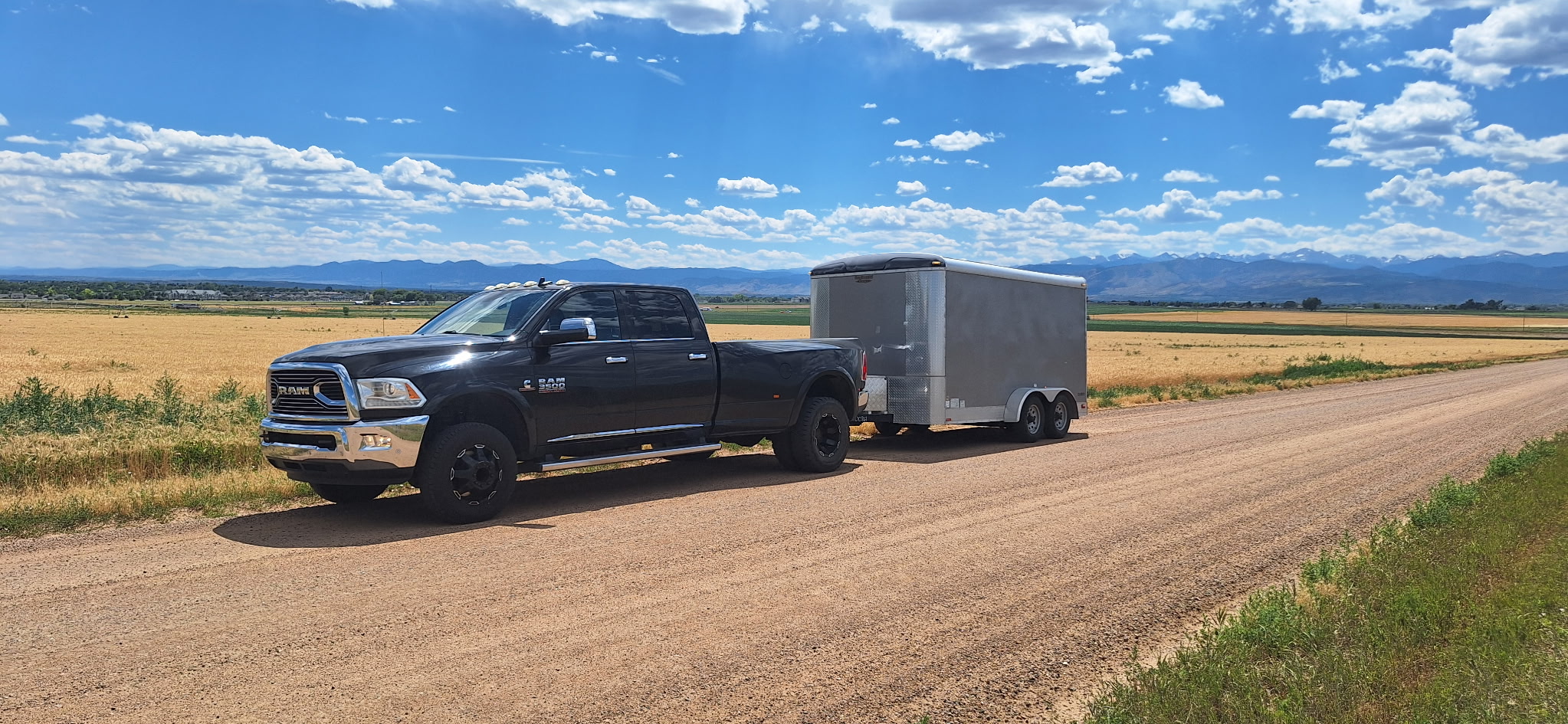 Motorcycle towing truck and enclosed trailer in Longmont Colorado